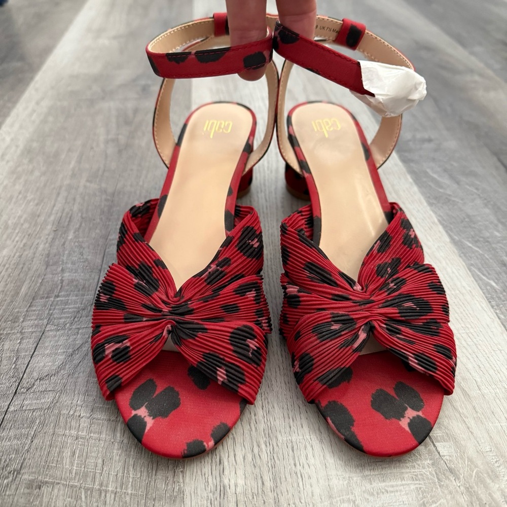 NWOB CAbi Siren Red Cheetah Sandals with 2" rounded blocked heels. Size US 9